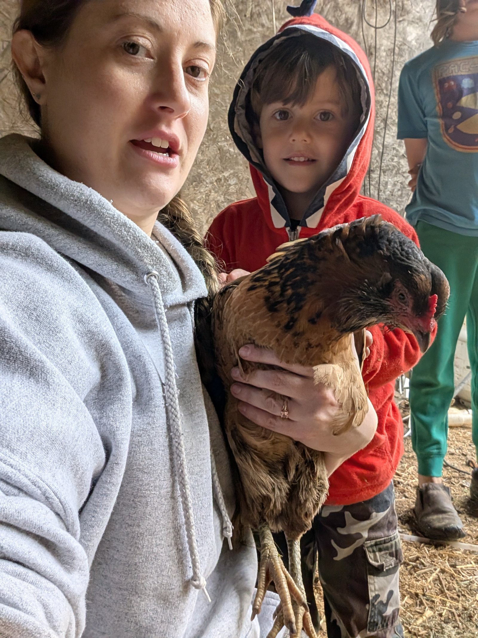 Casey and her family standing together at Crop Circuit in Southwest Michigan